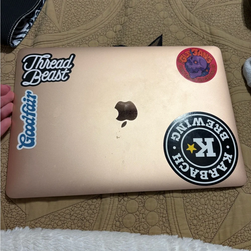 Apple MacBook in Gold with Unique Stickers